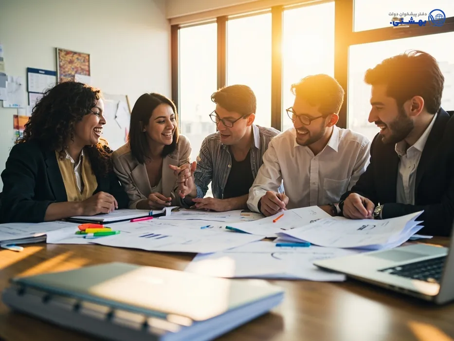 افرادی در حال بررسی طرح‌های اشتغال‌زایی و تکمیل فرم‌های درخواست وام سپاه